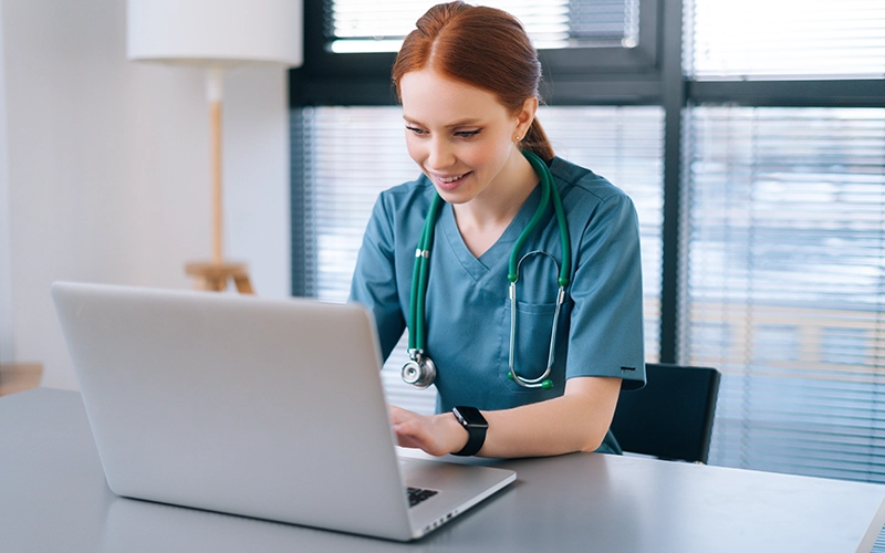 nurse on a laptop