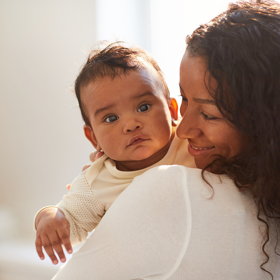 mom with smiling baby